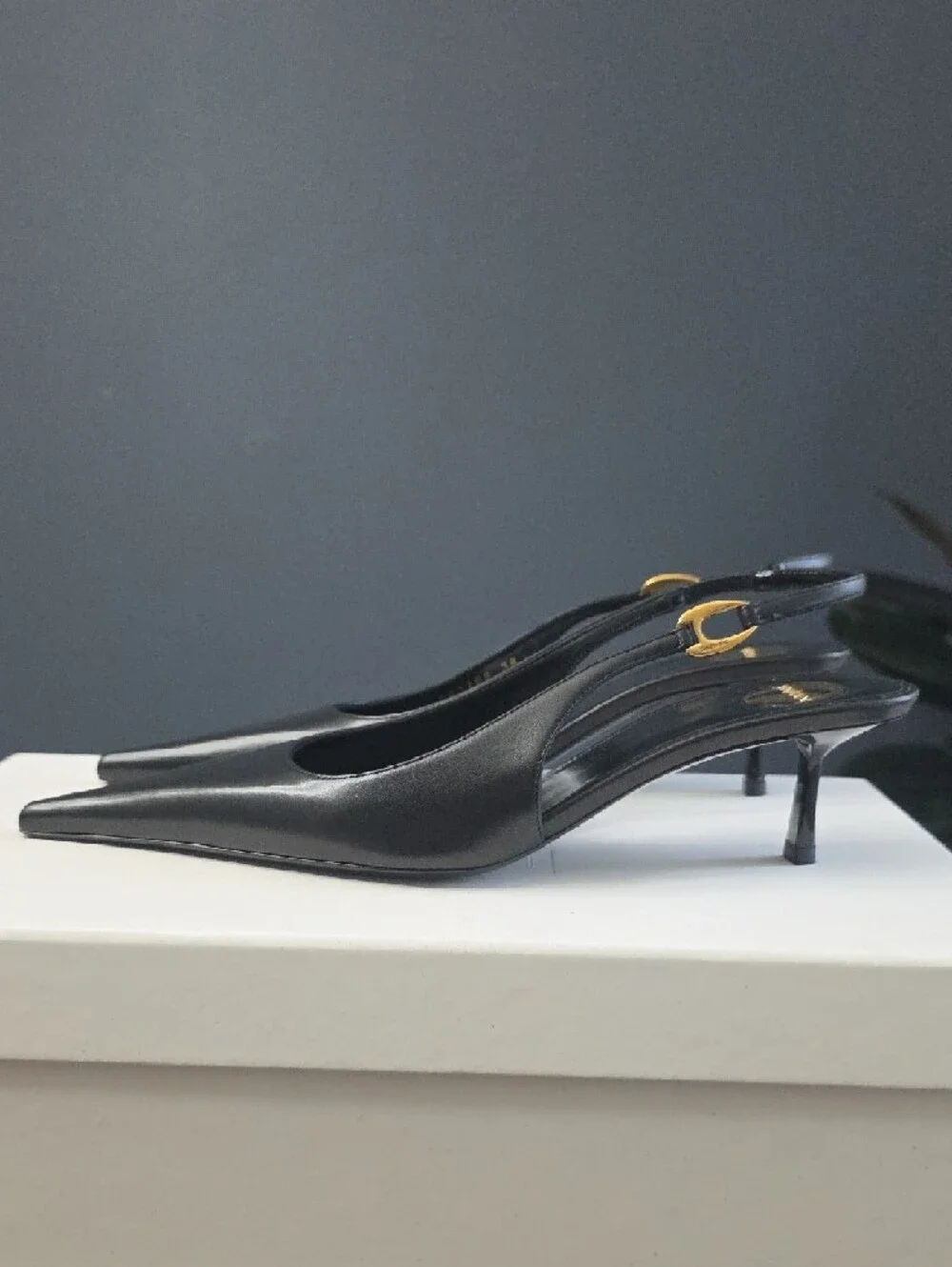 Saint Laurent Black Leather Pointed Slingback Pumps with Gold Accents - Picture 2 of 16